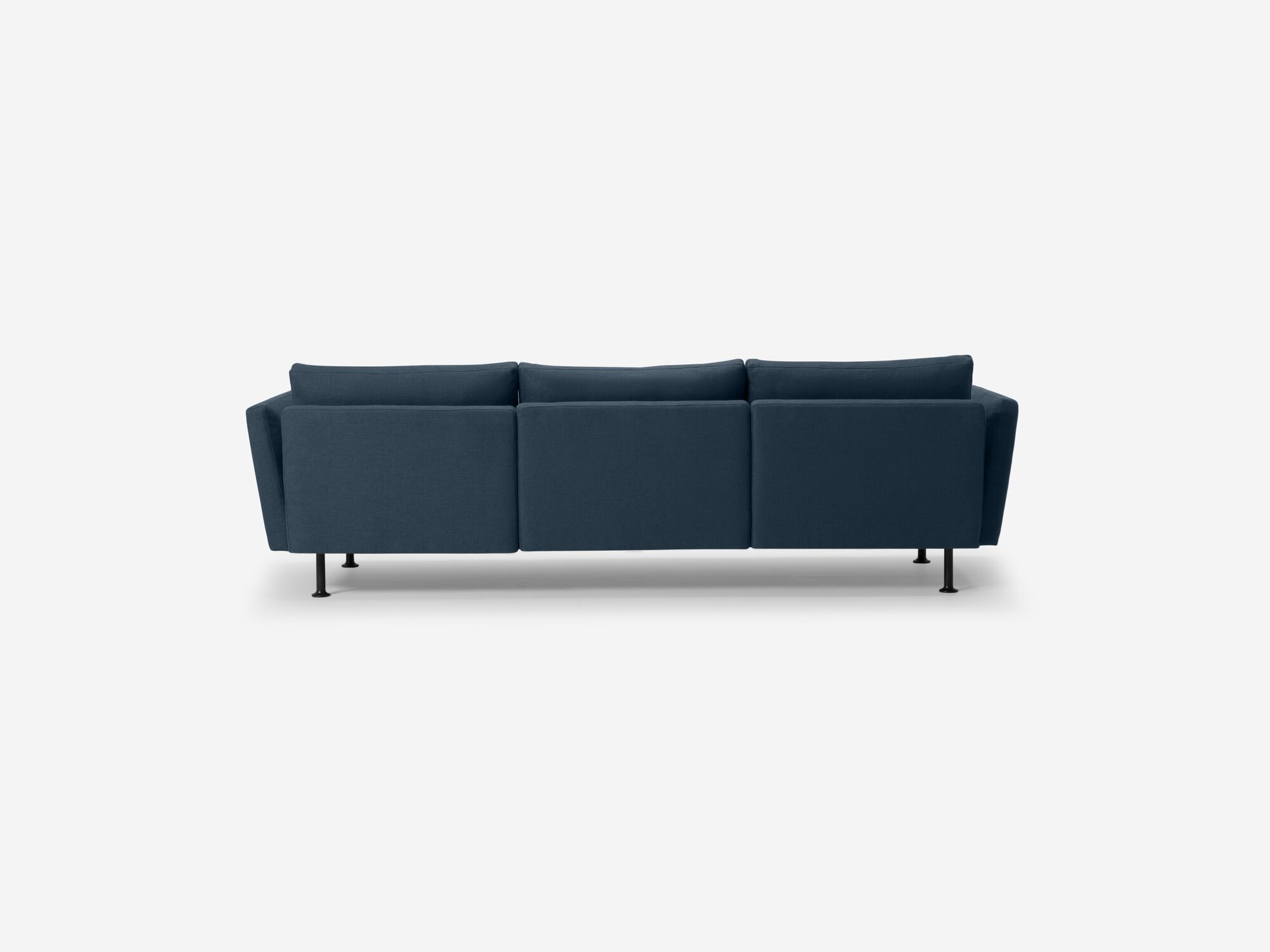 Modern blue sofa with high arms back view